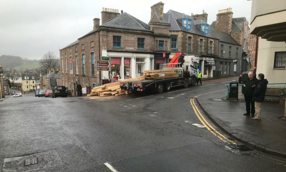 A lorry shed its load in Crieff sending wood flying.