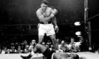Muhammad Ali knocks out Sonny Liston in a world championship bout.