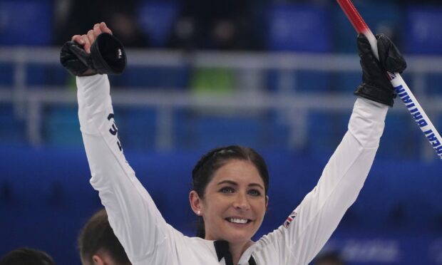Eve Muirhead celebrates after winning the women's curling final match.