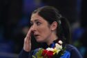 Eve Muirhead cries during the medal ceremony.