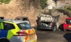 Man arrested in connection with Lochee car fire.