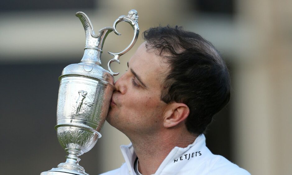 USA's Zach Johnson kisses the Claret Jug after winning The Open Championship 2015 at St Andrews.