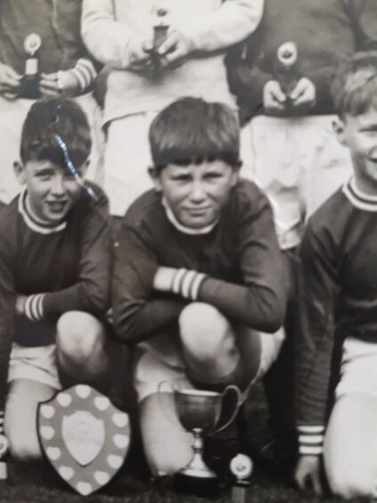 George Ferrie as a youngster in the football team.