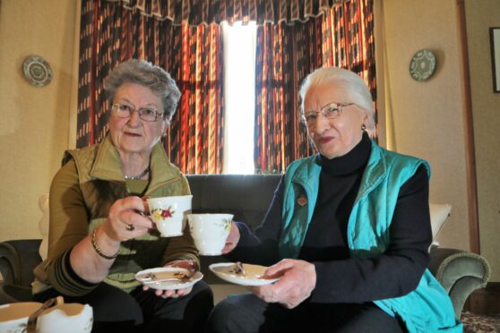 Kirriemuir Macmillan stalwarts Gloria Mitchell and Maimie Jamieson served the committee for its entire 50 years. Pic: Gareth Jennings/DCT Media.