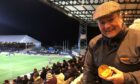 Michael Mulford with pie at Dens Park, Dundee