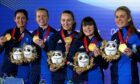 Great Britain's Eve Muirhead, Vicky Wright, Jennifer Dodds, Hailey Duff and Mili Smith celebrate with their gold medals.