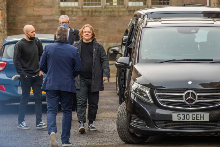 Singer Lewis Capaldi at the funeral of Lily Douglas.