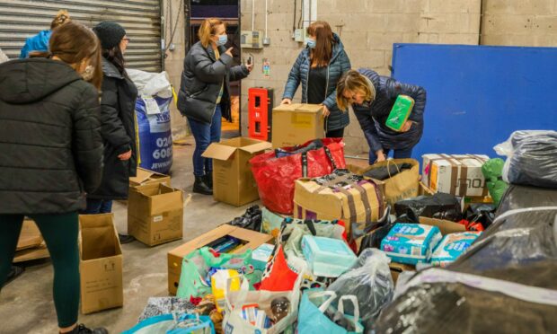 Perth's Polish Saturday School was inundated with donations on Monday Picture Steve MacDougall.