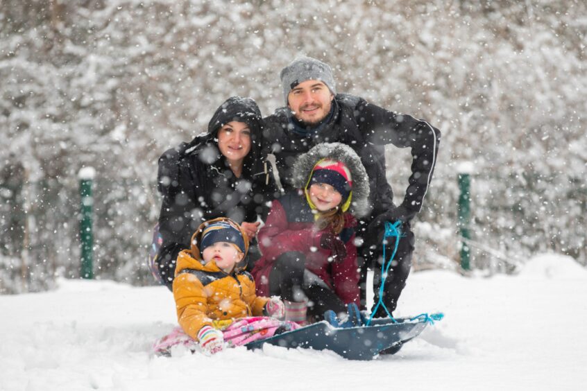 Snowy conditions also made for family fun as Fraser Ramsay and Sara Little went out sledging with their children Cassie and Cole Ramsay (aged 8 and 2), Lamberkine Drive, Perth.