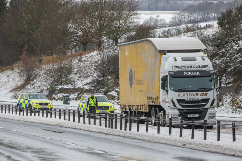 A lorry stuck on Cairine Braes - A9 northbound near Auchterarder which left only one lane open. 