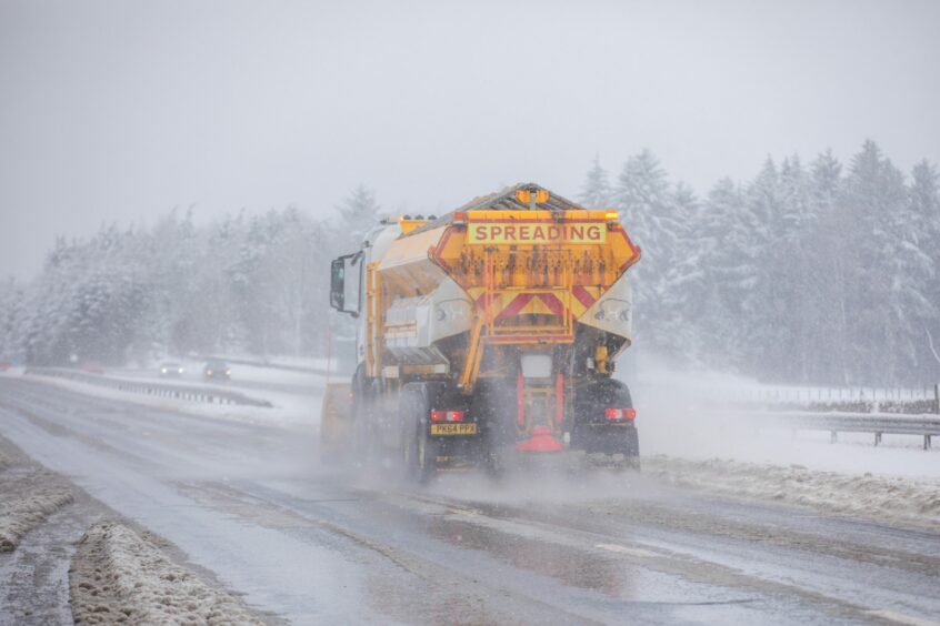 Road clearing on A9 at Tibbermore near Perth.
