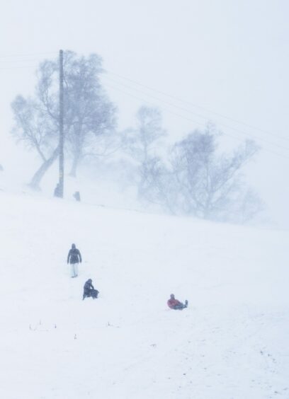 Sledgers brave the high winds in Glenshee. 