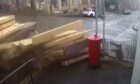 Woman in Crieff is nearly floored by wood flying from lorry.