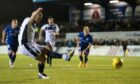 Charlie Adam puts Dundee ahead from the spot against Peterhead.
