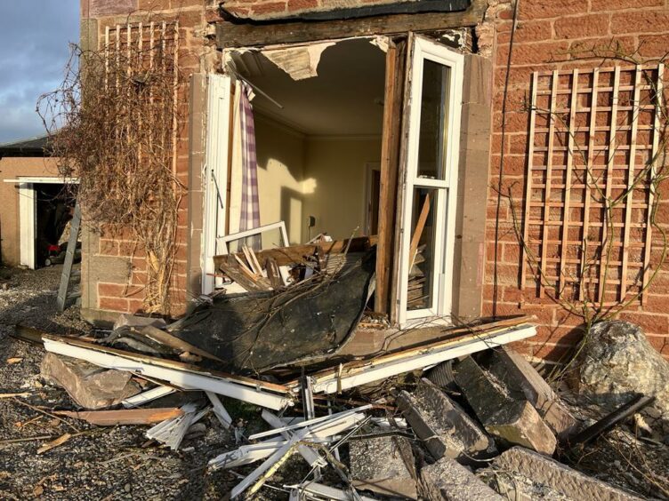 The bay window was left destroyed.
