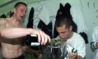 Rab Douglas and Shaun Maloney celebrate a Celtic title triumph.