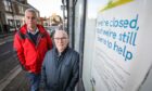 Carnoustie councillors Brian Boyd and David Cheape outside the town's former TSB branch. Pic: Mhairi Edwards/DCT Media.