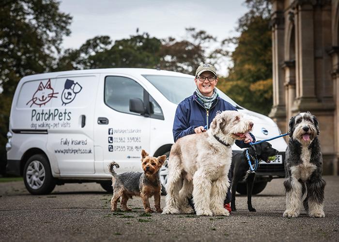 Morag Pacione and her dog. Morag, who runs Patch Pets dogwalking service, is an EV owner