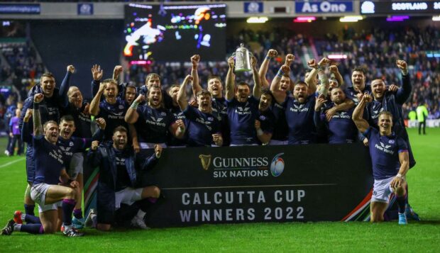 Scotland celebrate retaining the Calcutta Cup after their 20-17 win over England.