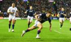 Scotland's Ben White scores the opening try.