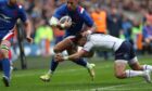 France's Gael Fickou goes through for the crucial try just before half-time.
