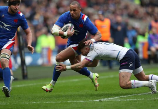 France's Gael Fickou goes through for the crucial try just before half-time.