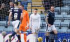 Christie Elliott celebrates his first league goal for Dundee.