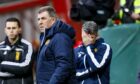 Mark McGhee watches on in his final game in charge of Motherwell in 2017.
