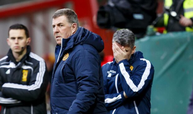 Mark McGhee watches on in his final game in charge of Motherwell in 2017.