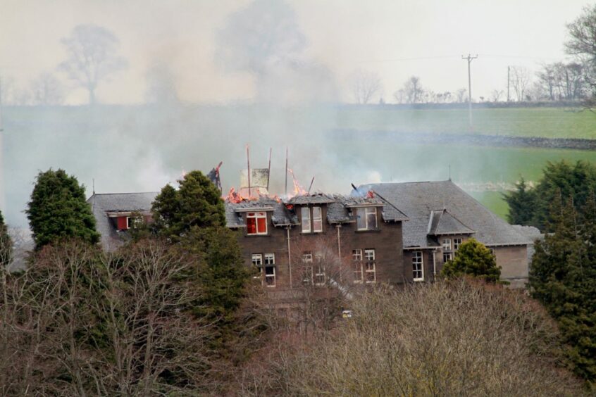 Strathmartine Hospital on fire