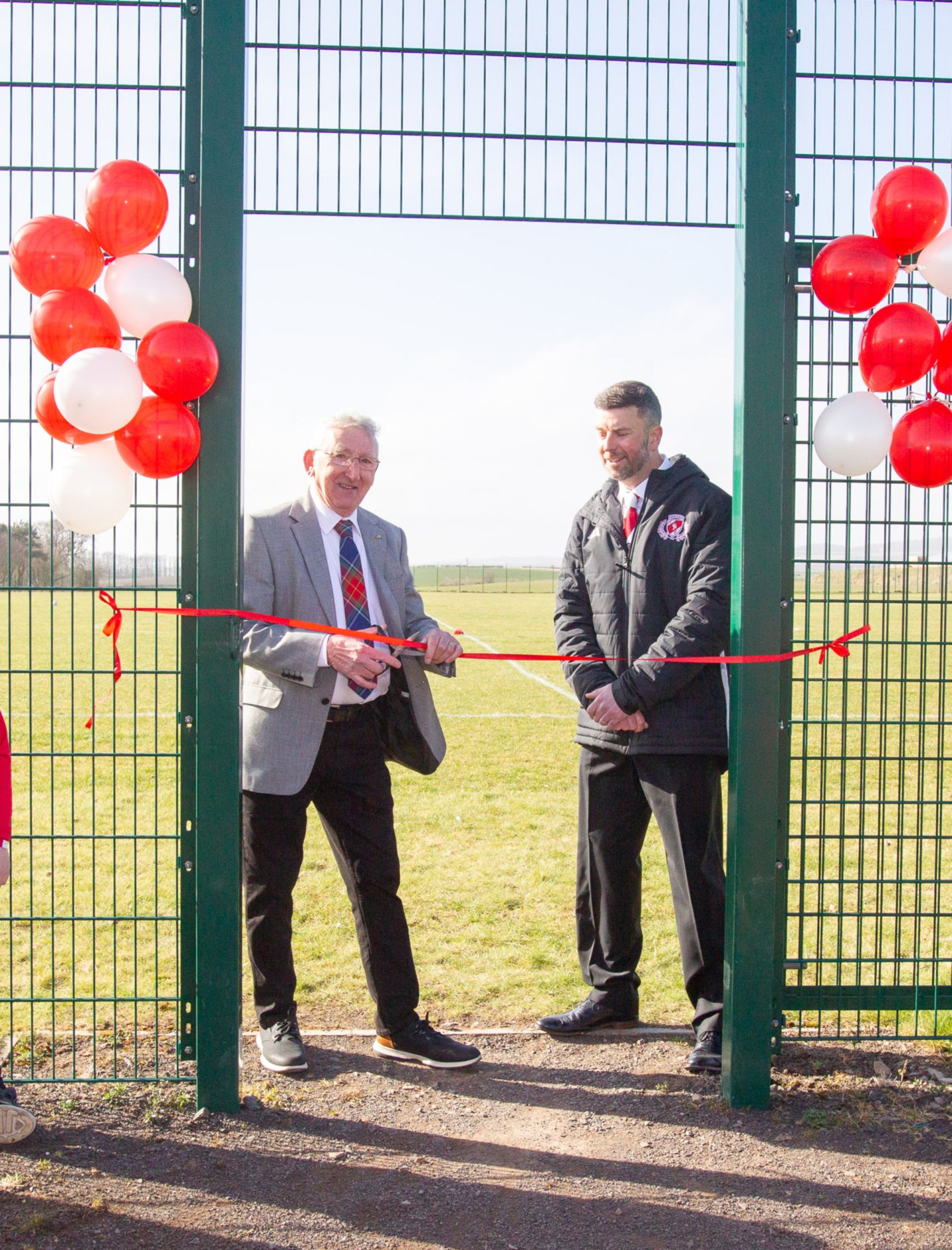Helen Oswald's husband, Ed, and Carnoustie Panmure CFC chairman Scott Arthur at the ribbon-cutting. Pic: Paul Reid.