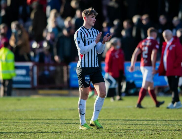Lewis McCann acknowledges the Dunfermline fans at full-time.