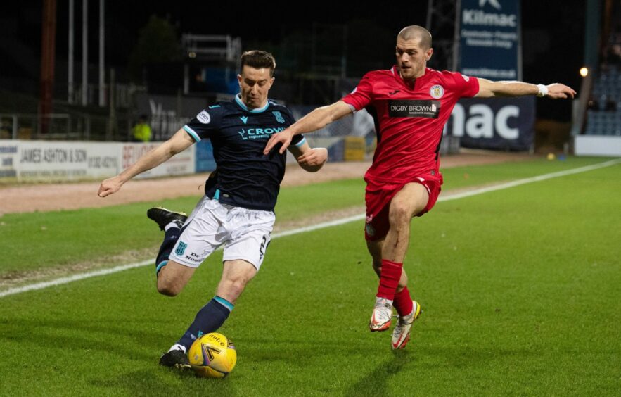 Dundee's Cammy Kerr battles with St Mirren's Alex Gogic