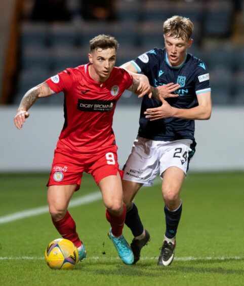 Eamonn Brophy is closed down by Dundee's Max Anderson 