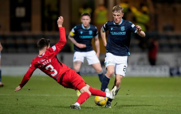 Dundee midfielder Max Anderson takes on St Mirren.