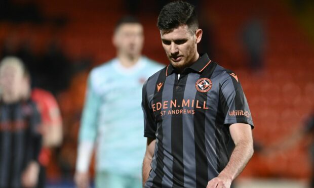 Dundee United's Adrian Sporle is dejected at full-time.