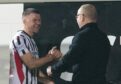 Dunfermline boss John Hughes congratulates man of the match Dom Thomas.