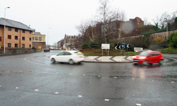 The car was travelling near the Ladywell Roundabout in Dundee.