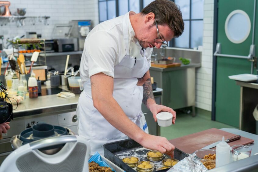 Adam Handling plating up his main course.