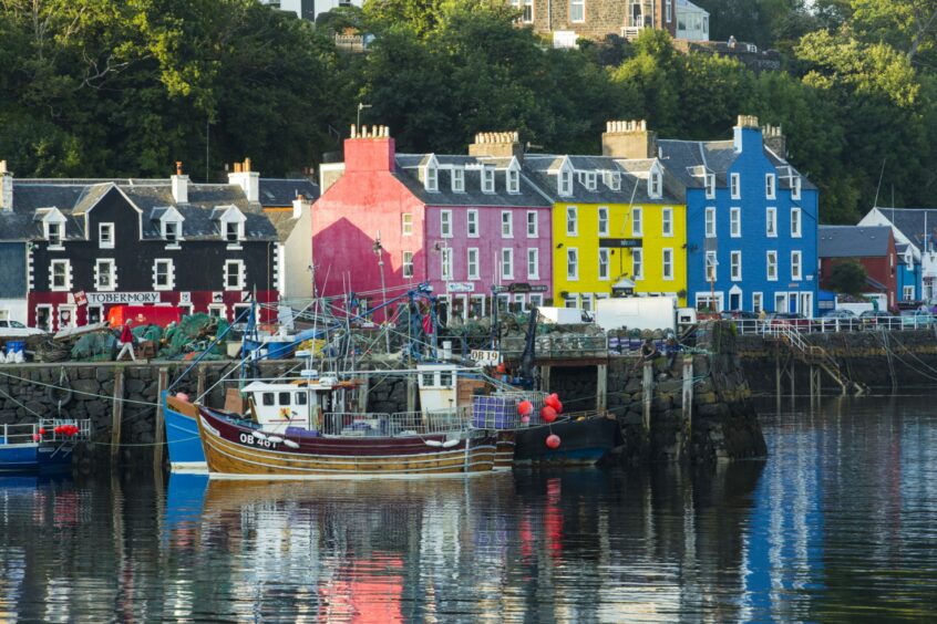 A row of colourful buildings the harbour area of Tobermory