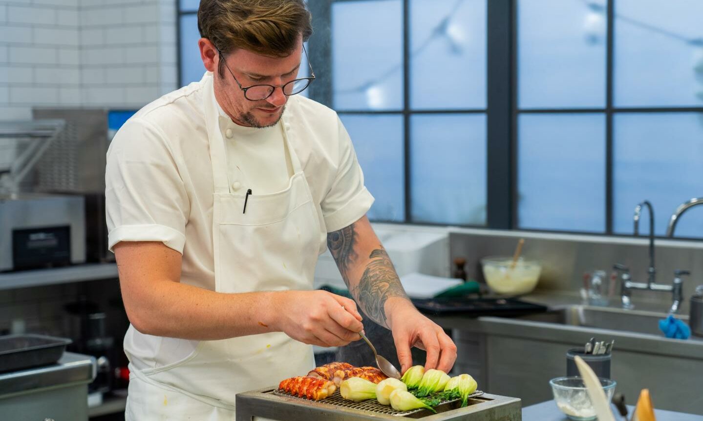 Adam Handling gets to grips with his fish course..