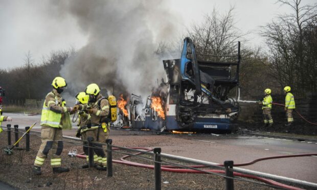 Firefighters tackling the blaze.