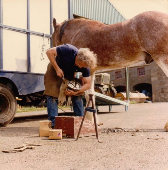 Fitting a horsehoe is David Wilson BEM from Fife.