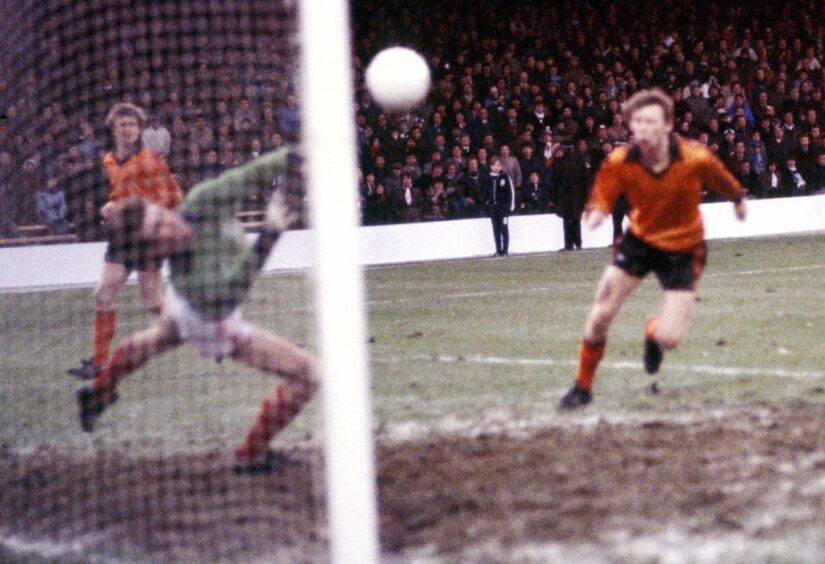 Dodds (right) fires the ball past Bobby Geddes in the 1980 League Cup final.