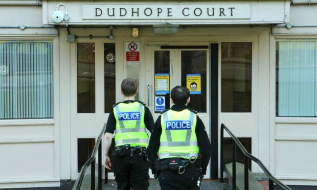 Police at Dudhope at the end of last  month after a woman's body was discovdered. It had been lying for around seven weeks