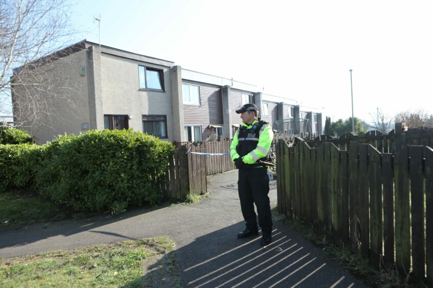 Police outside Whitfield Avenue in Dundee on Tuesday.