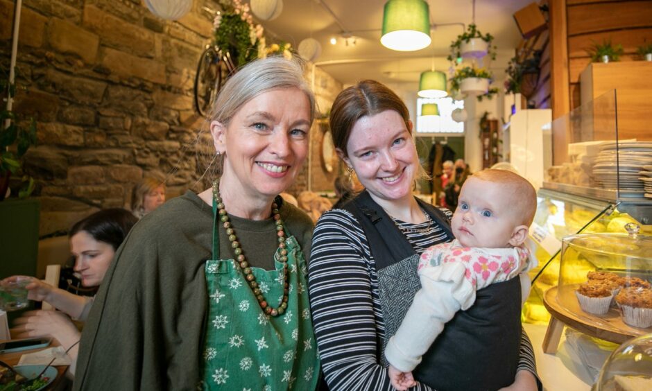 Jane Forbes (mum of owner), Zoe Lawson and her baby Lily. Sweetpea cafe.