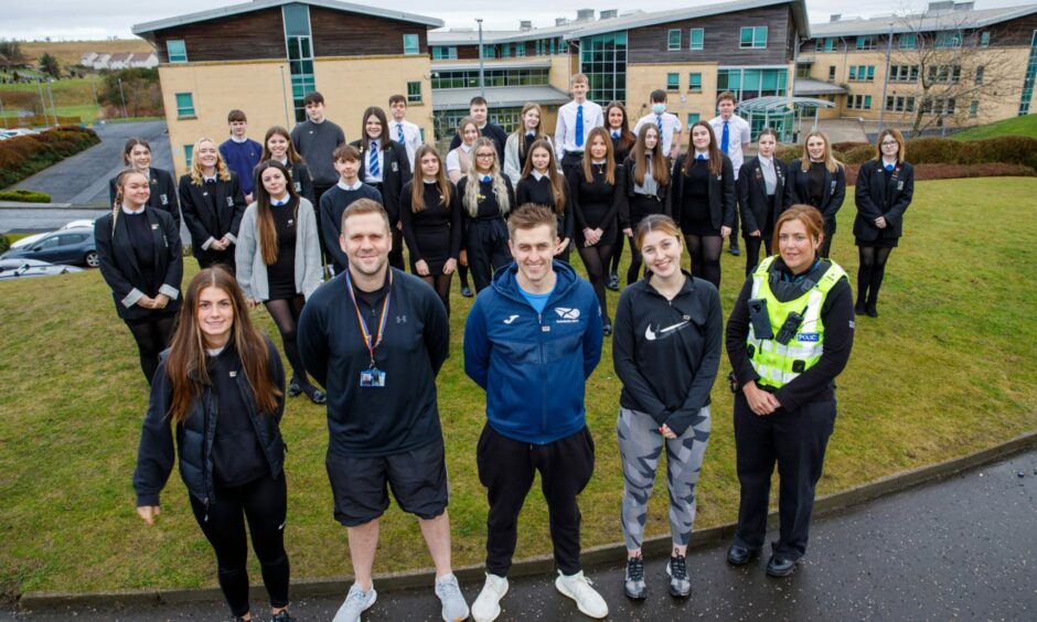 Some of the Beath High School pupils taking part in Mentors for Violence Prevention with teachers Hannah Gillan, David Lowrie and Keiran Lynch, Active Schools coordinator Rachel Scallan and community police officer PC Louise Sneddon. Picture by Kenny Smith/DCT Media.