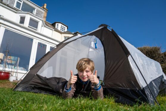 Harry with his tent.