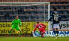 Connor Ronan scores a late header, beating Dundee's Harrison Sharp to win the game for St Mirren